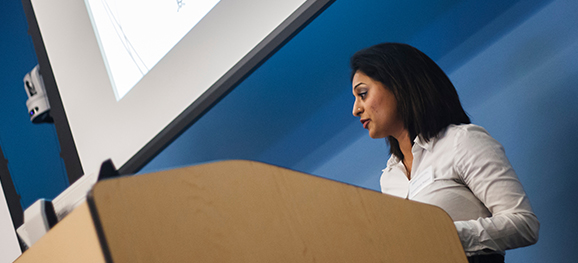Student gives capstone presentation for HAP 790